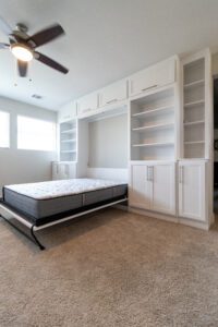 Side view of vertical queen Murphy bed in open position