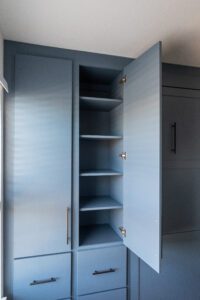 Adjustable shelving for Murphy bed cabinet