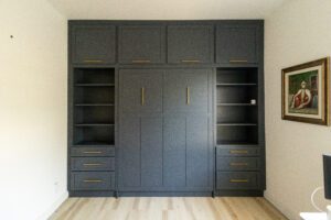 Vertical queen Craftsman Murphy bed with custom cabinetry, painted