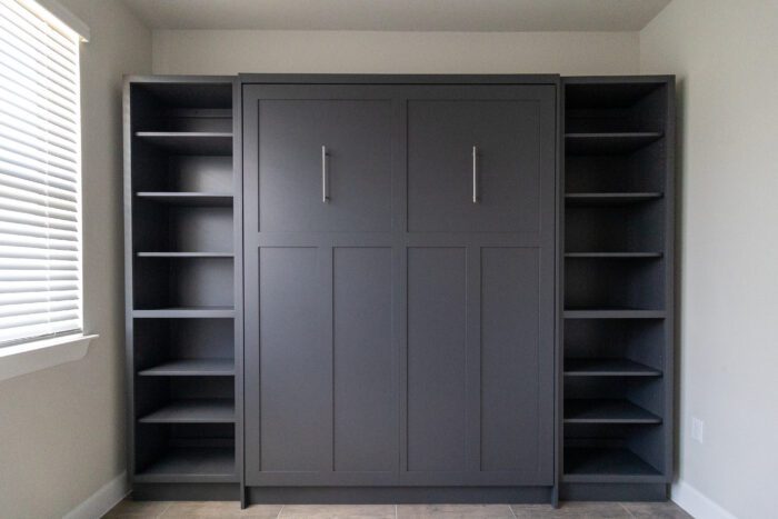 Vertical queen Craftsman Murphy bed with bookcases, painted in Cheating Heart