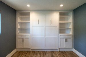 Vertical queen Shaker Murphy bed with custom cabinets, painted Super White