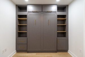 Vertical queen Rivington Murphy bed with custom cabinetry, painted in Cheating Heart