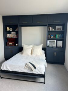 Queen Craftsman Murphy bed with built-in cabinets in open position