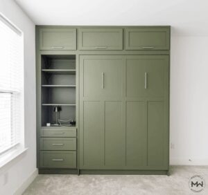 Sage green Shaker-style Murphy bed with upper cabinets, shelving, and drawers, handcrafted by Madewell Woodworks in Austin, Texas.