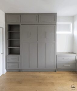 Gray Shaker Murphy bed with built-in drawers and shelving, custom handcrafted in Austin, Texas by Madewell Woodworks.