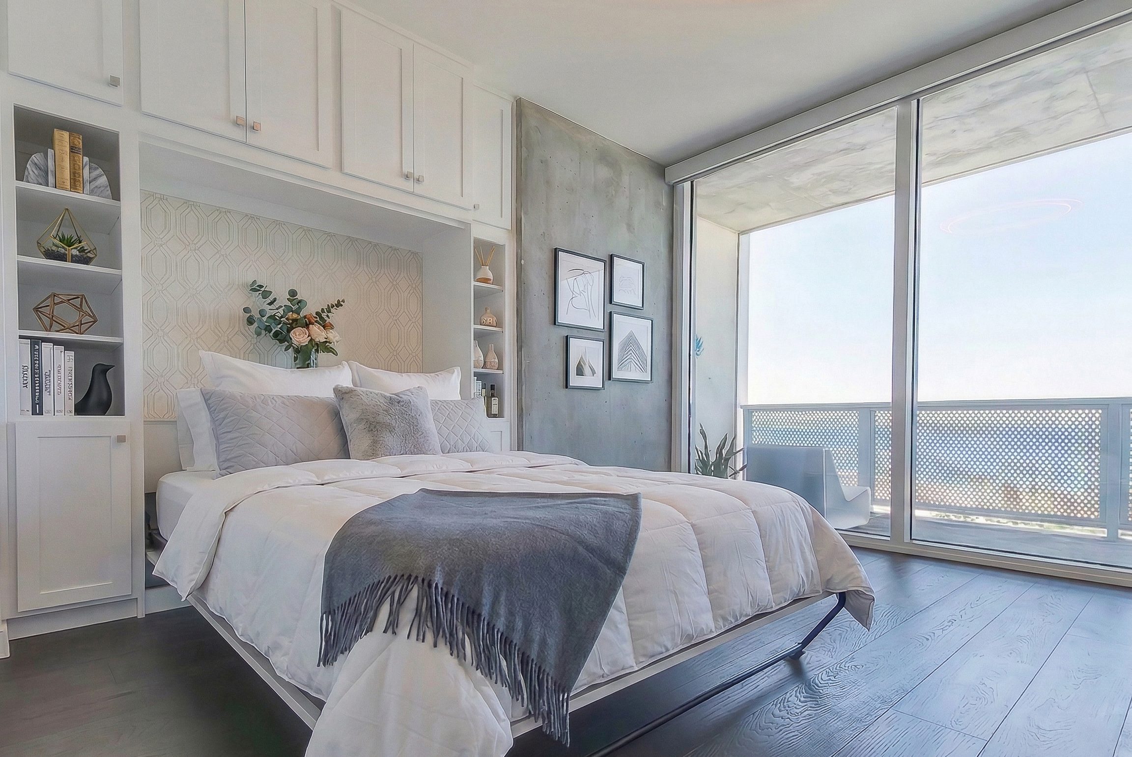 Custom white built-in Murphy bed with open shelving, Austin TX