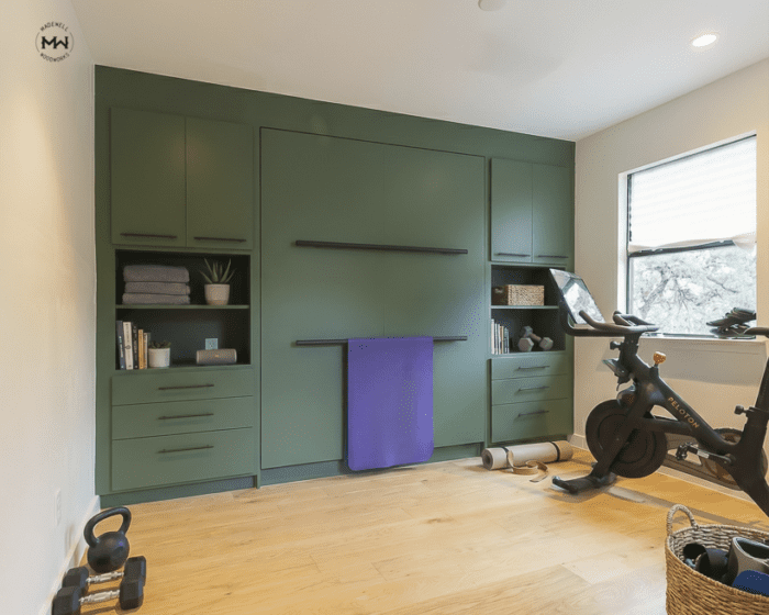 Queen vertical Murphy bed with built-in cabinetry and open shelving, Martha's Vineyard green finish with matte black pulls, West Lake Hills TX