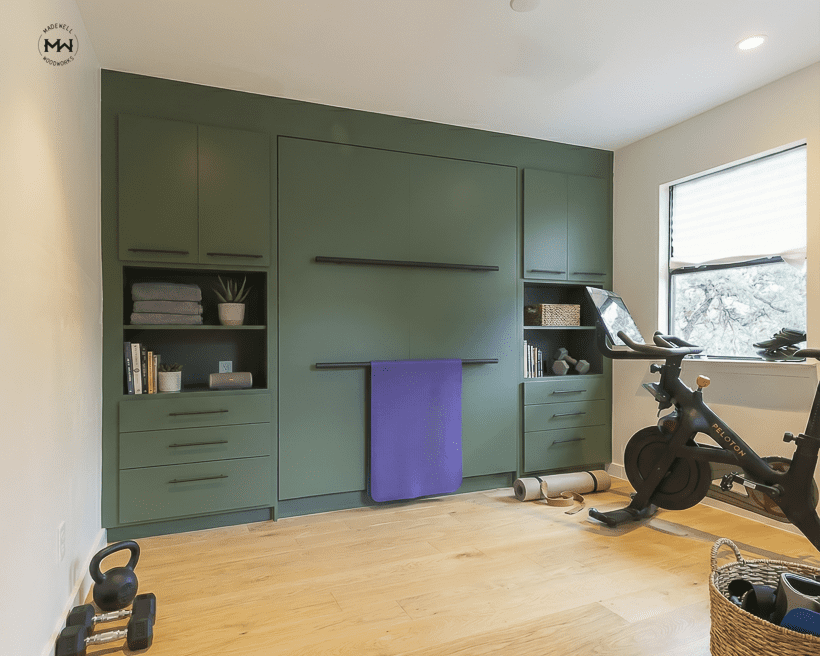 Queen vertical Murphy bed with built-in cabinetry and open shelving, Martha's Vineyard green finish with matte black pulls, West Lake Hills TX